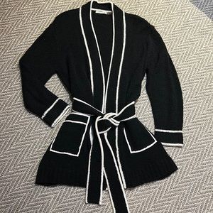 Gently used Alice & Olivia cardigan sweater, size S, color black and white